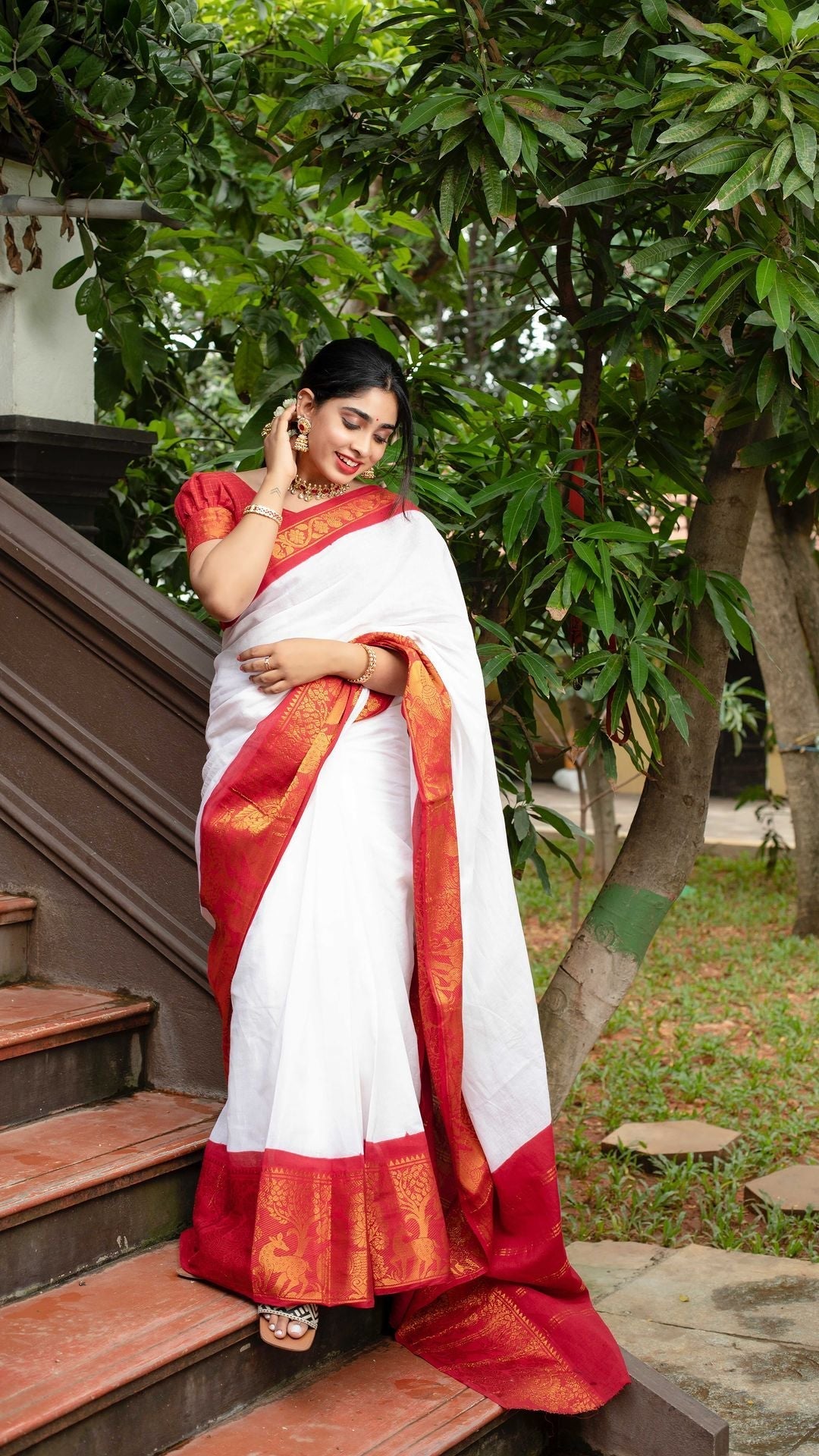 Designer smooth silk saree with intricate paisley design