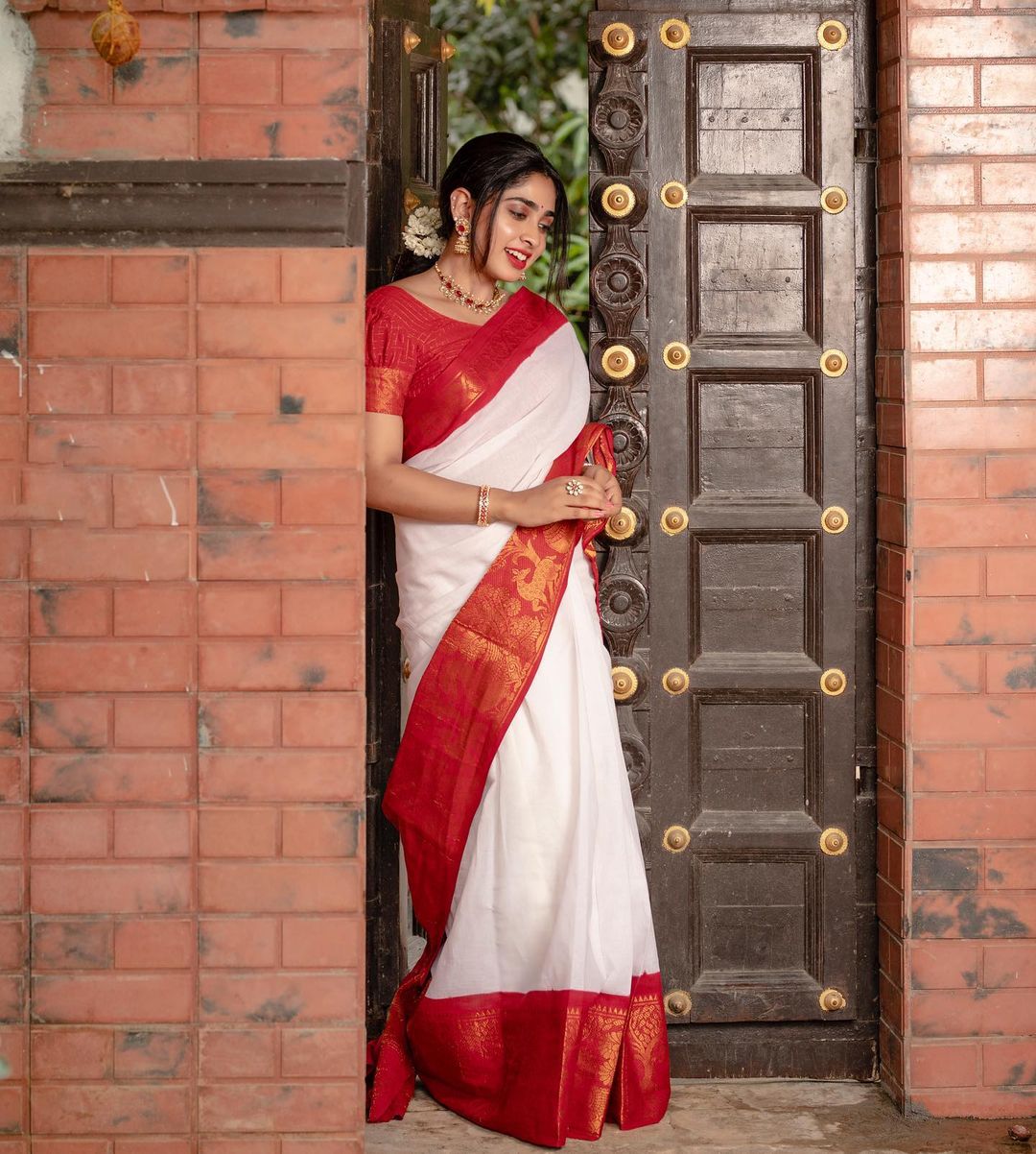 Banarasi silk saree with elegant peacock and floral motifs