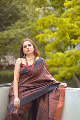 Pure katan silk saree with delicate paisley motifs