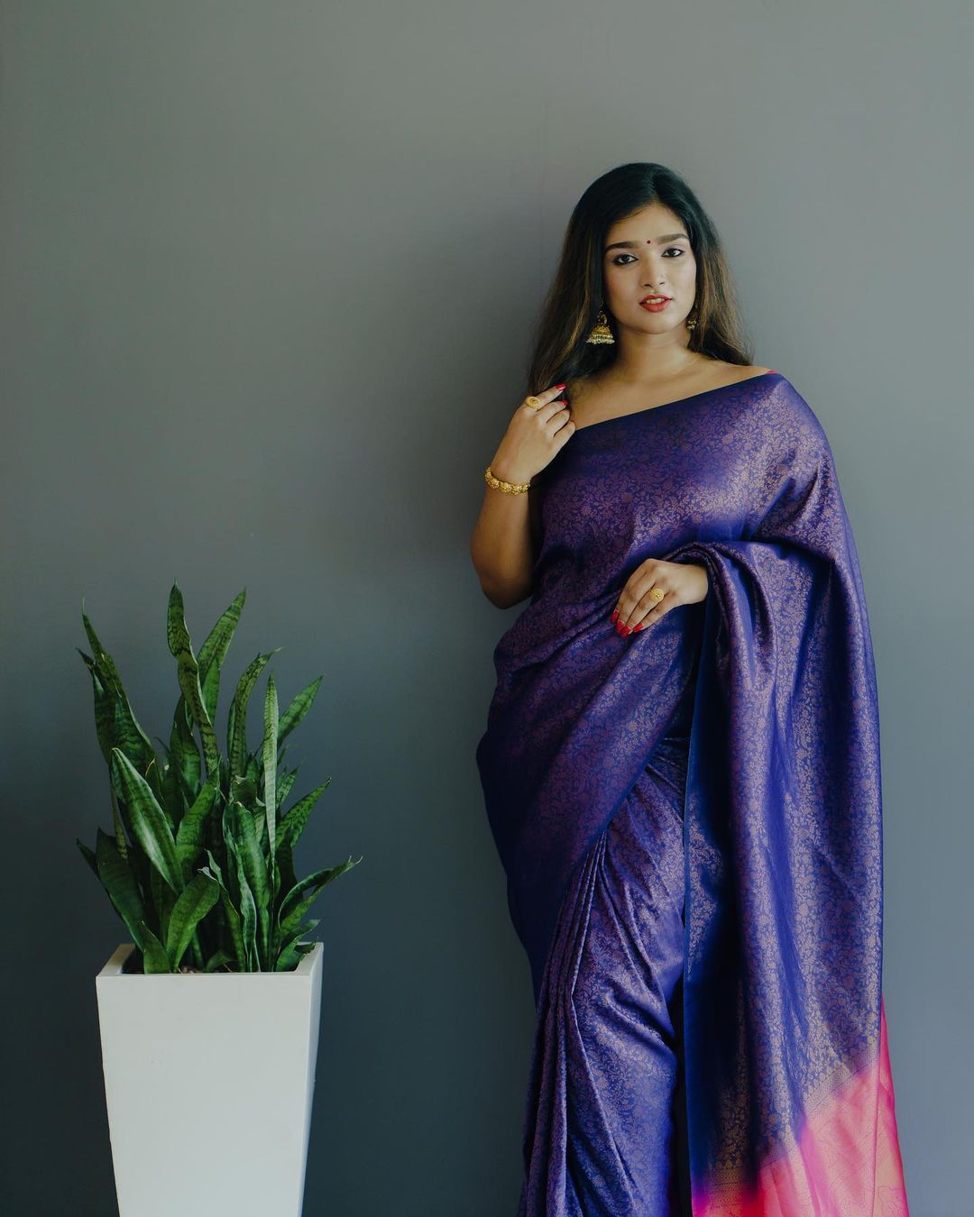 Jacquard silk saree in regal shades of blue and gold
